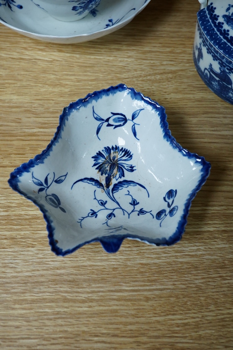 A group of 18th century Worcester and Liverpool porcelain teaware and a Caughley Cormorant fisherman butter tub and cover.